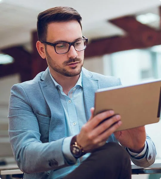 Professional man working on a tablet